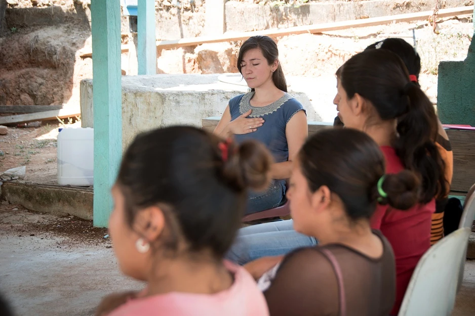 Dr. Fátima Rodríguez (center), who directs the mental health program for PIH in Mexico, leads a yoga and mindfulness session